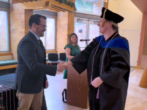 Handshake at a veterans' graduation ceremony